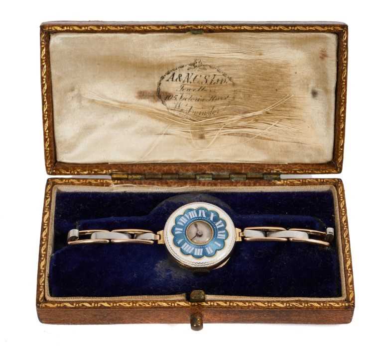 Lot 3 - The Countess of Strathmore GCVO, DSt.J, (mother of Lady Elizabeth Bowes-Lyon - later H.M. Queen Elizabeth The Queen Mother)  1920s lady's 15ct gold and guilloché enamel wristwatch on 15ct gold and...