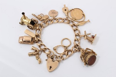 Lot 607 - 9ct gold charm bracelet