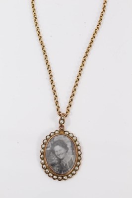 Lot 608 - 9ct gold and seed pearl locket on chain