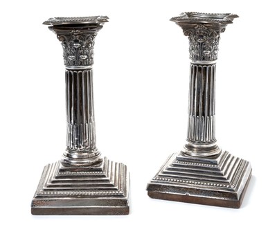 Lot 401 - Pair of George V silver candlesticks converted to table lamps