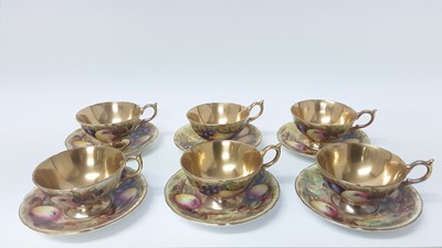 Lot 1107 - Set of six Aynsley Orchard Gold teacups and saucers