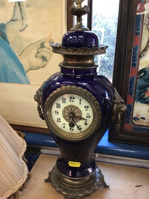 Lot 215 - Late 19th century timepiece in blue ceramic urn shape case