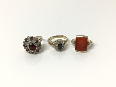 Lot 654 - Two 9ct gold gem set dress rings and 10k gold intaglio ring with engraved Roman head