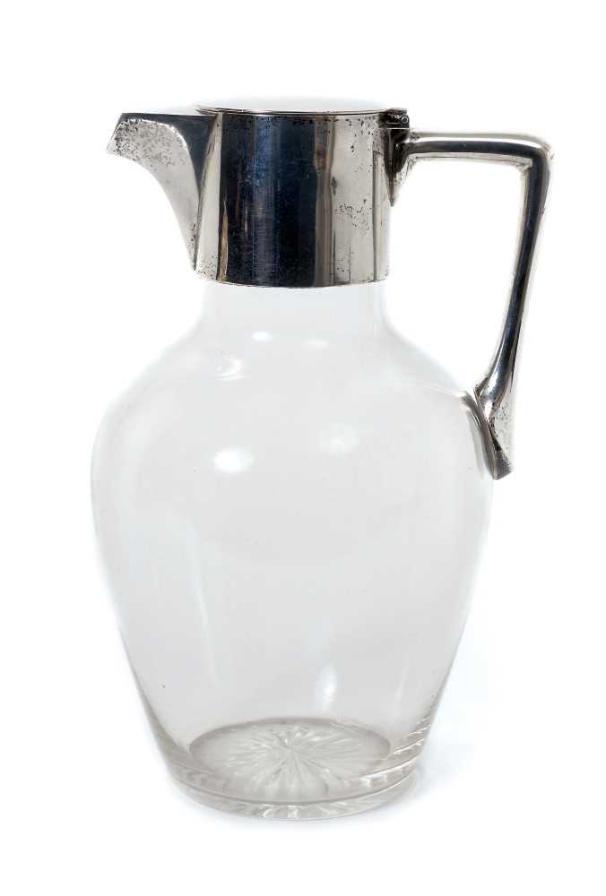 Lot 379 - Silver mounted claret jug after a design by Christopher Dresser