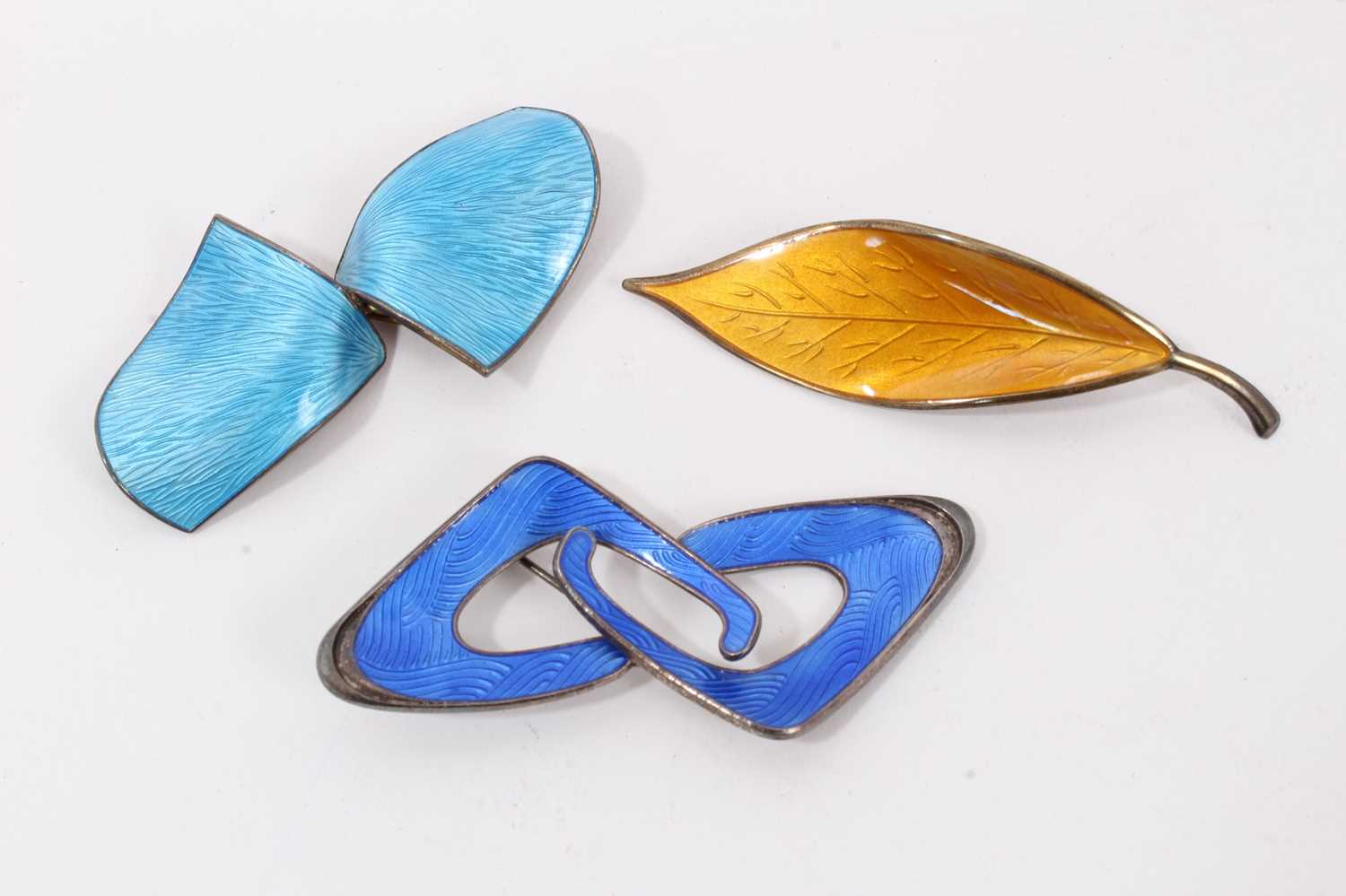 Lot 2 - Three Norwegian silver and enamel brooches