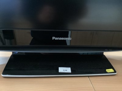 Lot 128 - Panasonic TV with remote and manual