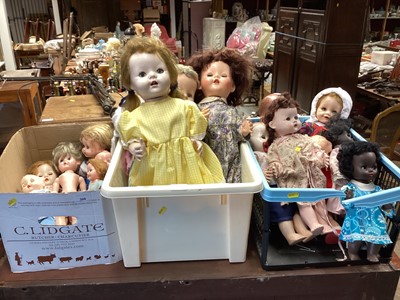 Lot 388 - Four boxes of assorted dolls to include walking dolls, porcelain half dolls and others