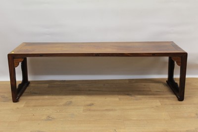 Lot 1268 - Antique Chinese padouk low table, raised on carved end supports and brackets, 127cm long x 37cm deep x 38cm high