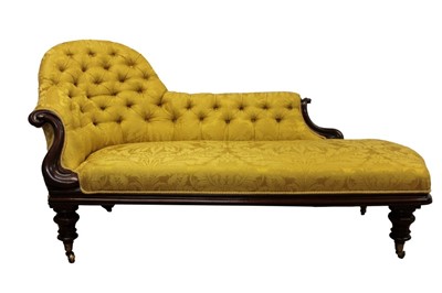 Lot 1271 - Victorian mahogany chaise longue, with yellow satin foliage upholstery on faceted legs and castors, approximately 180cm long