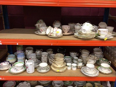 Lot 524 - Five shelves containing a large quantity of assorted cups and saucers and other teaware to include Royal Albert