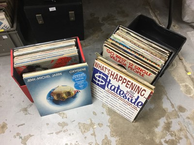 Lot 320 - Two vintage cases of LP records and 12 inch singles including Stevie Wonder, James Brown, Village People, Elton John, Joe Jackson and War of the Worlds. Approx 95 discs