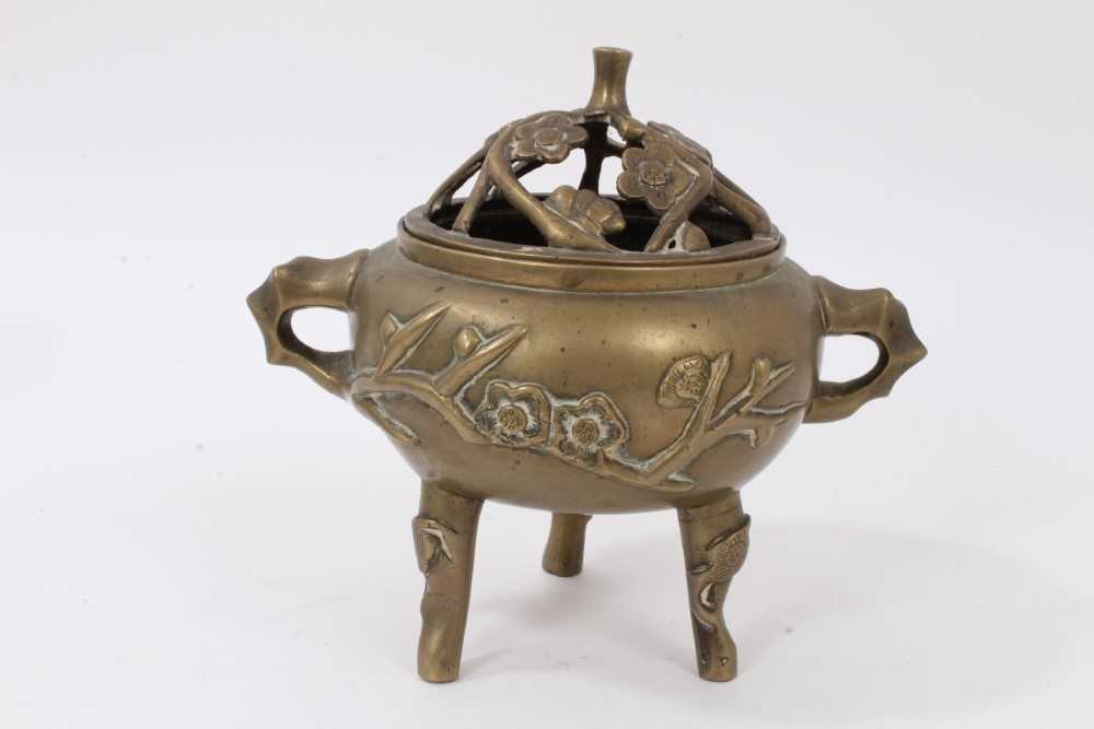 Lot 844 - Chinese bronze censer with prunus decoration, reign mark to base