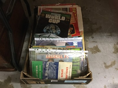 Lot 315 - Box of 1950's and later Football Monthly magazines, World Cup, Arsenal year book.
