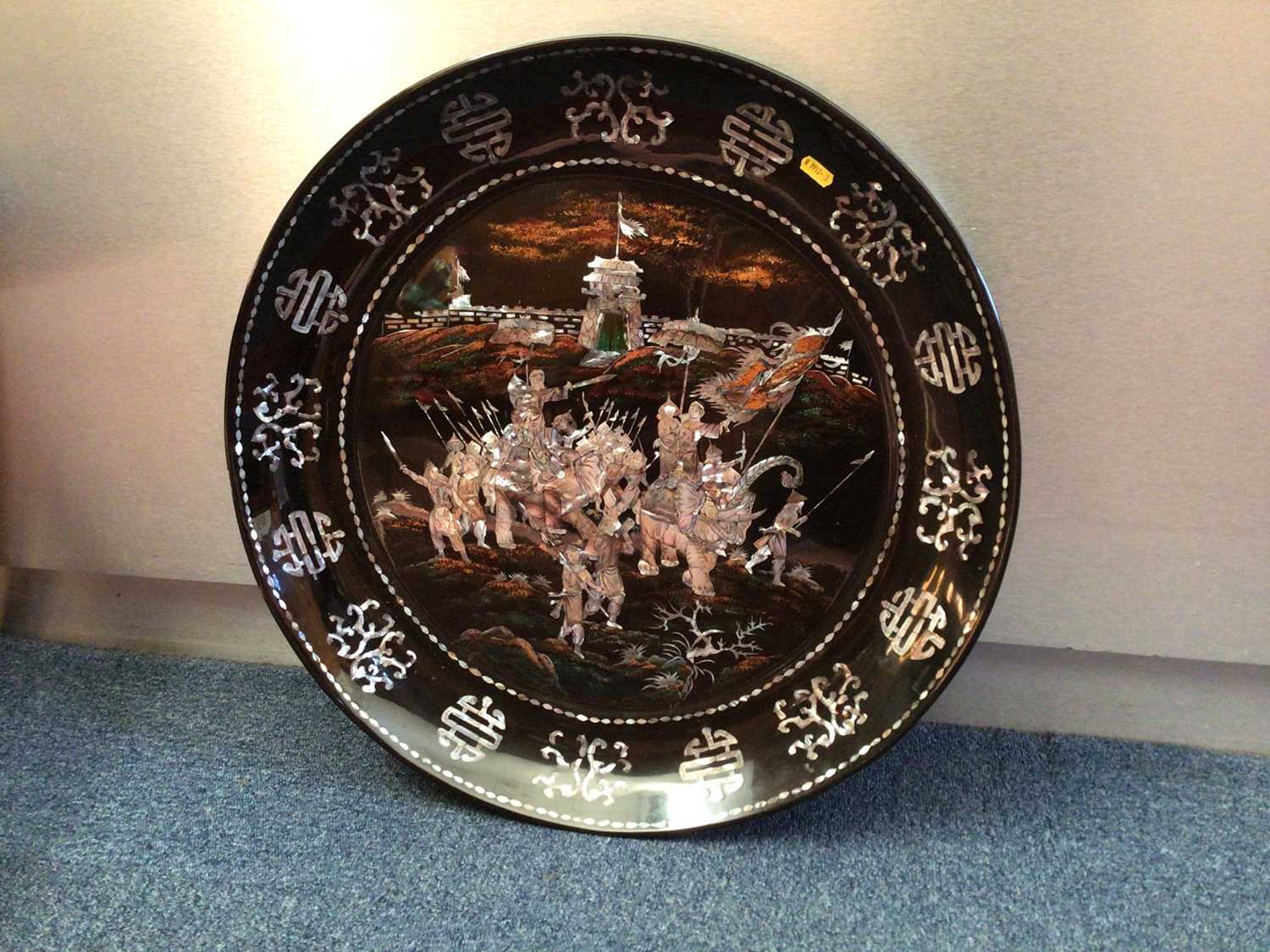 Lot 90 - Large Eastern mother of pearl inlaid dish decorated with warriors, with character marks around the edge, together with a similar box, possibly Chinese