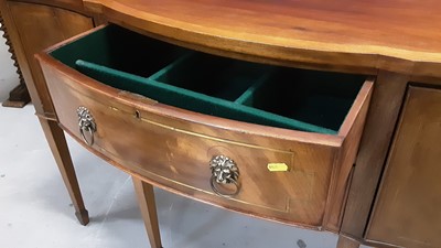 Lot 851 - Good quality Georgian style brass inlaid mahogany serpentine fronted sideboard with two central drawers flanked by cupboards on square taper legs and spade feet, 137cm wide, 54cm deep, 92cm high