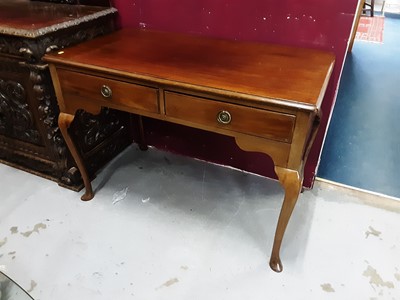 Lot 853 - 19th century style mahogany writing table with two drawers on cabriole legs, 106cm wide, 58cm deep, 76cm high