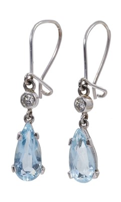 Lot 556 - Pair of aquamarine and diamond pendant earrings