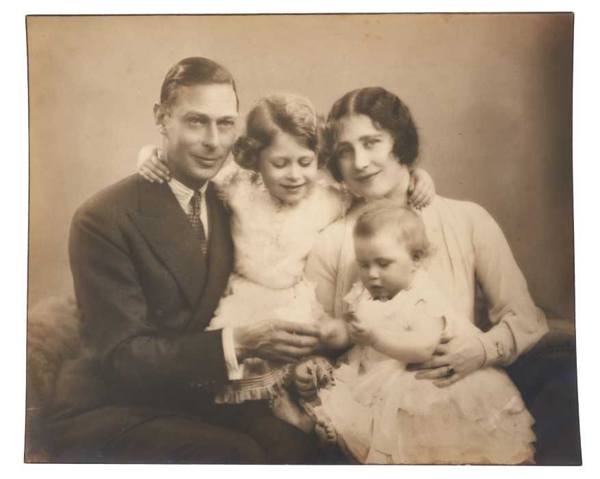 Lot 22 - T.R.H.The Duke and Duchess of York (later T.M. King George VI and Queen Elizabeth) charming 1930s portrait photograph of the Royal couple with their infant daughter Margaret and five year old dau...