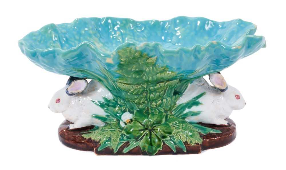 Lot 111 - Rare Victorian Minton majolica rabbit and lettuce leaf comport, modelled as two rabbits supporting a leaf-shaped dish, painted with coloured glazes, 25cm wide, impressed marks, shape no. 1451, circ...