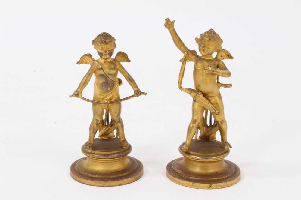 Lot 779 - Pair of 19th century gilt metal Cupid figures