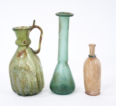 Lot 234 - Three Roman glass flasks
