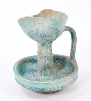Lot 235 - Turquoise glazed faience oil lamp