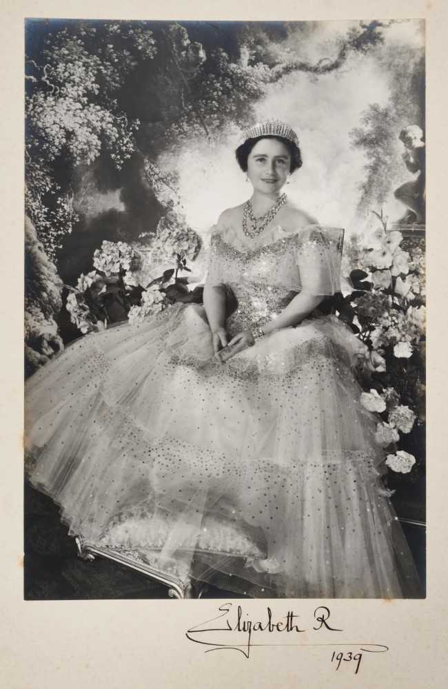 Lot 24 - H.M. Queen Elizabeth (later The Queen Mother), fine signed Cecil Beaton wartime portrait photograph of the Queen wearing a beautiful sequinned ball gown, a diamond tiara and diamond necklace , si...