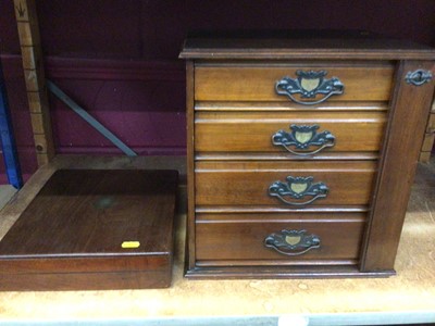 Lot 550 - Early 20th century miniature chest of four drawers and a mahogany cutlery box