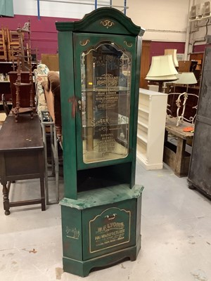 Lot 926 - Unusual green painted shop's corner cabinet, with gilt advertisement and glass back