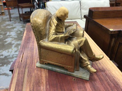 Lot 192 - Art Nouveau style gilt metal figural bookend in the form of a seated gentleman, signed J Ruhl