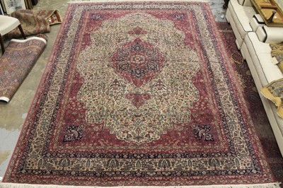 Lot 1426 - Large machine made Eastern rug