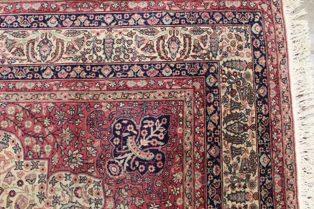 Lot 1426 - Large machine made Eastern rug