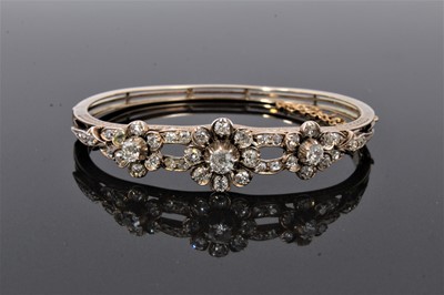 Lot 563 - Victorian diamond hinged bangle in fitted leather box