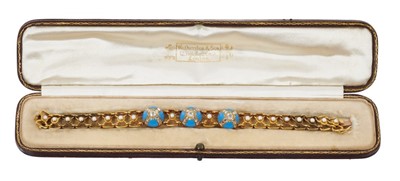 Lot 564 - Victorian diamond turquoise enamel and seed pearl bracelet in tooled brown leather box