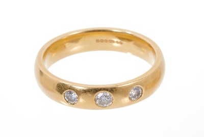 Lot 682 - Diamond three stone ring with gypsy style setting