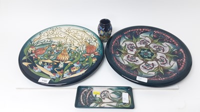 Lot 1105 - Two large Moorcroft dishes together with pin tray and small vase