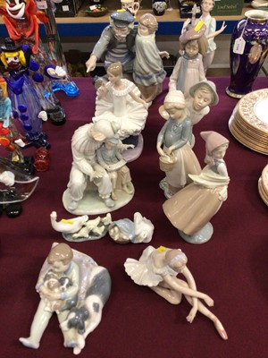 Lot 1121 - Eleven Lladro and Nao porcelain figures