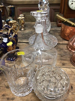 Lot 26 - Stuart cut glass carafe, Edinburgh Crystal cut glass jug, Waterford cut glass ships decanter, two other decanters and a cut glass rose bowl