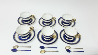 Lot 1109 - Set of six Aynsley bone china coffee cups and saucers with cobalt blue and gilt decoration with a set of six silver gilt and cobalt blue enamel coffee spoons (Birmingham 1967)