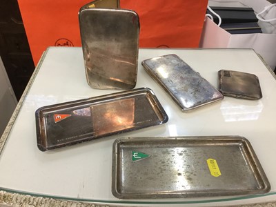 Lot 711 - Two silver cigarette cases, silver powder compact and two continental silver (800 standard) trays