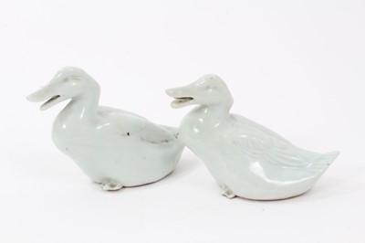 Lot 224 - Pair of Chinese celadon glazed ducks