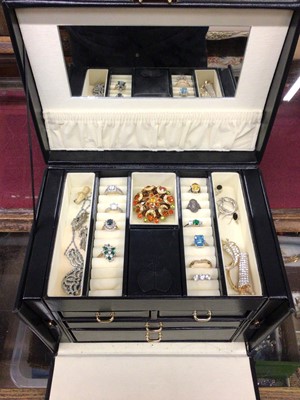 Lot 670 - Jewellery box containing 9ct white gold three stone ring, other gem set dress rings, necklaces, brooches, some silver jewellery and one 9ct gold hoop earring