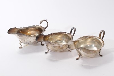 Lot 366 - Pair of silver sauce boats by Viners, together with another silver sauce boat (3)
