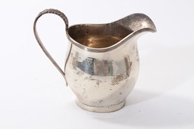 Lot 367 - Silver cream jug (Chester) together with a silver christening mug of tapered form (2)
