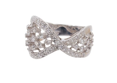 Lot 668 - Diamond crossover ring in 18ct white gold setting