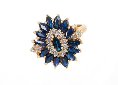 Lot 669 - Sapphire and diamond cluster in 18ct gold setting