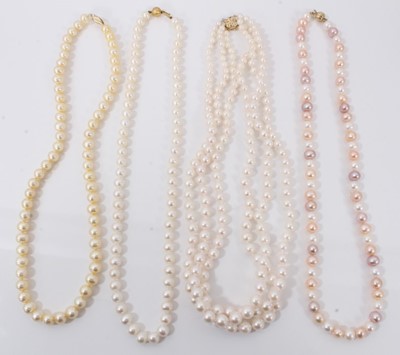 Lot 670 - Four cultured pearl necklaces with gold clasps