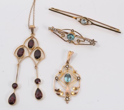 Lot 671 - Edwardian garnet pendant necklace, Edwardian gold blue stone and seed pearl pendant, Edwardian 15ct aquamarine and seed pearl bar brooch and Edwardian blue topaz and seed pearl brooch (4)