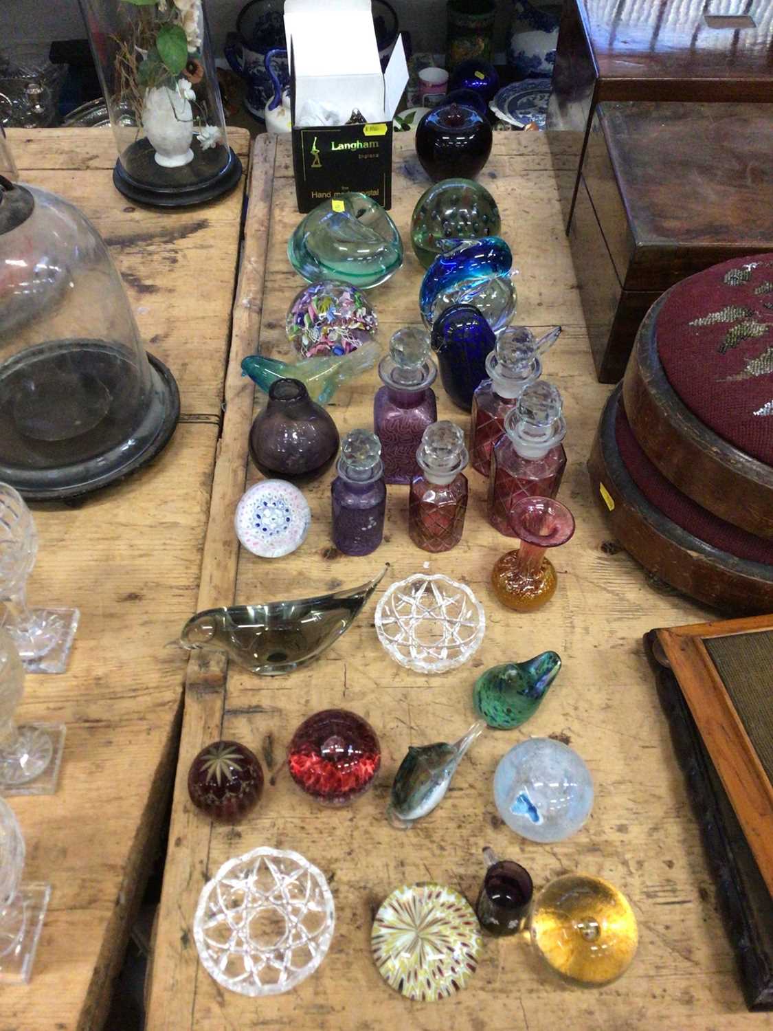Lot 16 - Collection of paperweights, scent bottles and other glass, including Isle of Wight, Langham and Fabergè Style