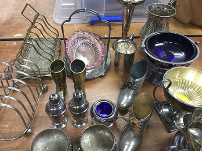Lot 275 - Collection of 19th century and later silver plated wares to include, toast racks, christening mug, fish servers and other items.